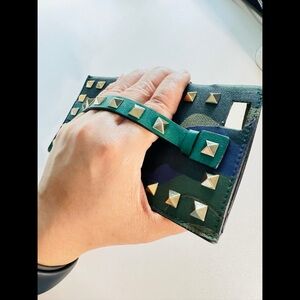 Valentino Garavani Rock studded Cell Phone Case with secure handle strap